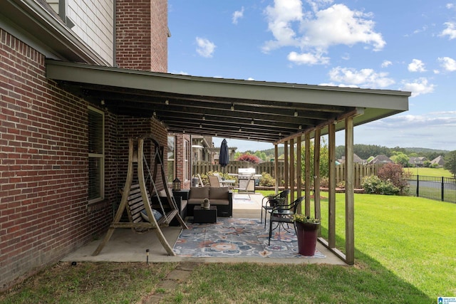 view of patio featuring a grill, an outdoor living space, and a fenced backyard