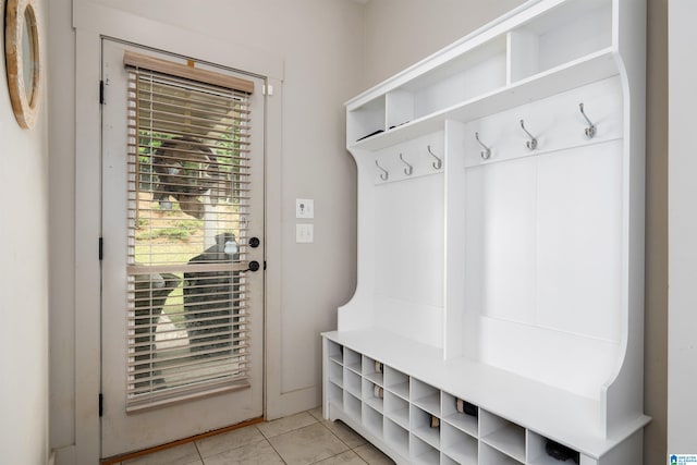 mudroom with light tile patterned floors