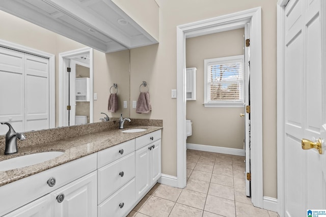 1938 Pleasant Ridge Loop, Sylacauga, AL 35150 - bathroom with toilet, baseboards, and a sink