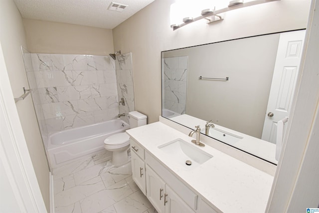 841 Olde Mill Trce, Cottondale, AL 35453 - bathroom featuring marble look tile flooring, toilet, a textured ceiling, washtub / shower combination, and vanity