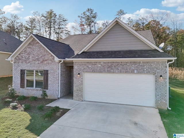 single story home featuring driveway, a shingled roof, and a garage