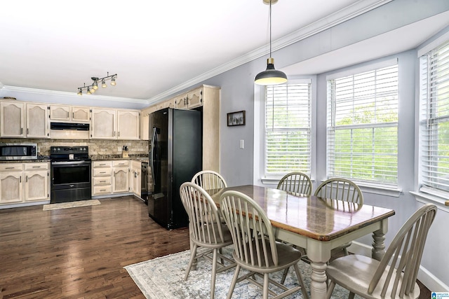165 Ashford Ln, Alabaster, AL 35007 - dining space with track lighting, ornamental molding, and dark wood finished floors
