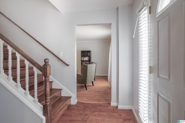 165 Ashford Ln, Alabaster, AL 35007 - entryway featuring stairs, baseboards, crown molding, and wood finished floors