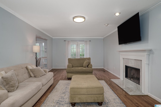 165 Ashford Ln, Alabaster, AL 35007 - living room featuring baseboards, ornamental molding, wood finished floors, and a high end fireplace