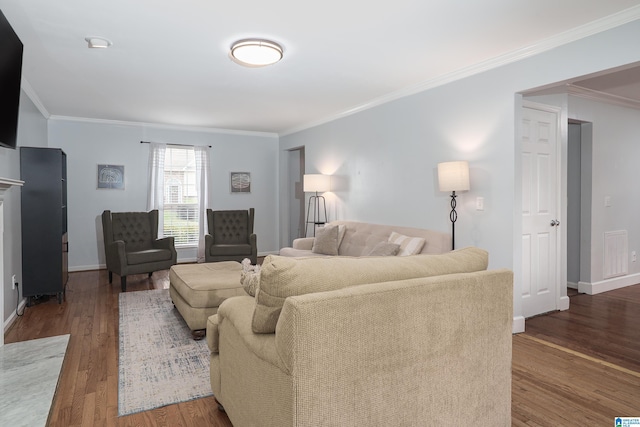 165 Ashford Ln, Alabaster, AL 35007 - living room featuring crown molding, baseboards, wood finished floors, and visible vents