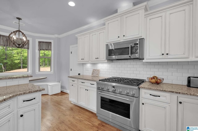 kitchen with white cabinetry and stainless steel appliances