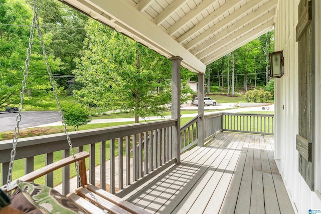 2607 Woodfern Ct, Homewood, AL 35209 - wooden terrace featuring covered porch