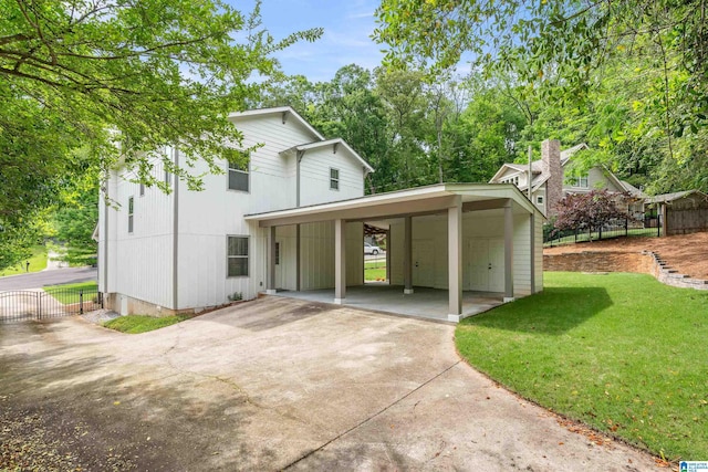 2607 Woodfern Ct, Homewood, AL 35209 - exterior space featuring a lawn, fence, and driveway
