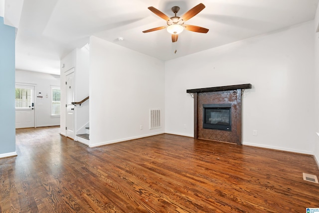 2607 Woodfern Ct, Homewood, AL 35209 - unfurnished living room featuring ceiling fan, visible vents, dark wood-style floors, and stairway