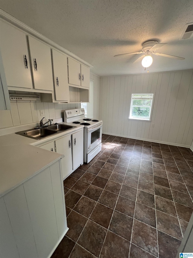 1701 Mount Pleasant Rd, Clanton, AL 35045 - kitchen with a sink, ceiling fan, visible vents, white cabinetry, and white range with electric cooktop