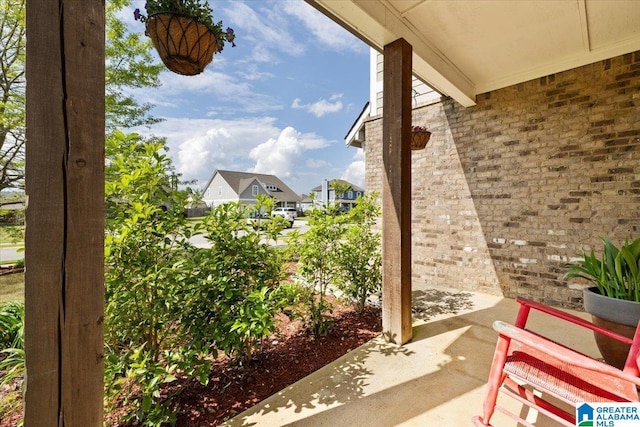 view of patio with a residential view