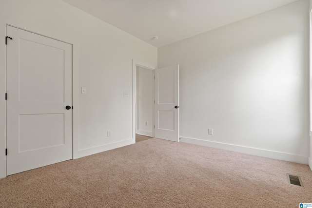 670 Hillstone Dr, Pell City, AL 35125 - unfurnished bedroom with visible vents, carpet, and baseboards