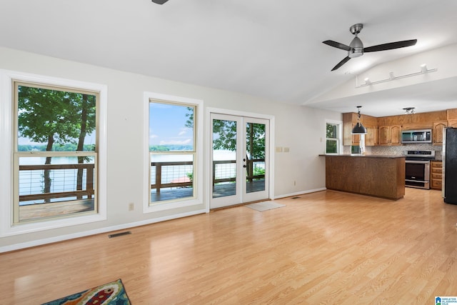 3516 Griffitt Bend Rd, Talladega, AL 35160 - unfurnished living room featuring a ceiling fan, lofted ceiling, and healthy amount of natural light