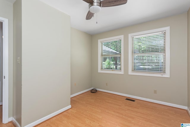 3516 Griffitt Bend Rd, Talladega, AL 35160 - unfurnished room with light wood-type flooring, baseboards, and a ceiling fan