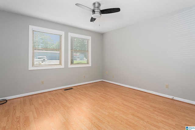 3516 Griffitt Bend Rd, Talladega, AL 35160 - spare room featuring light wood-type flooring, ceiling fan, and baseboards