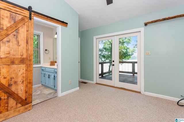 3516 Griffitt Bend Rd, Talladega, AL 35160 - doorway featuring light colored carpet, french doors, and baseboards