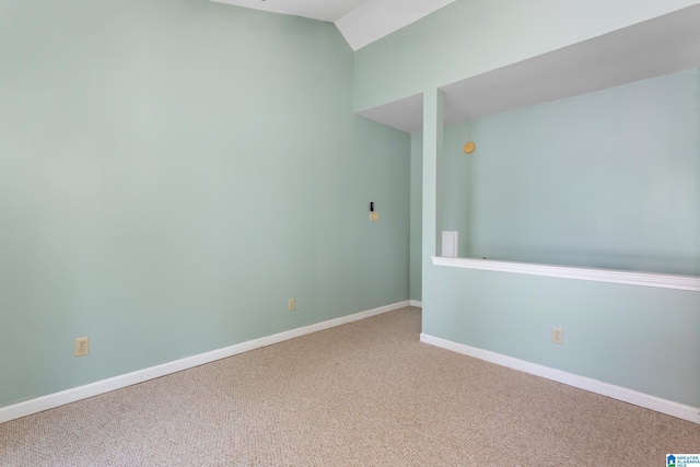 3516 Griffitt Bend Rd, Talladega, AL 35160 - carpeted empty room with baseboards and vaulted ceiling