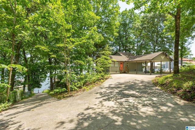 3516 Griffitt Bend Rd, Talladega, AL 35160 - view of front facade featuring driveway and a carport