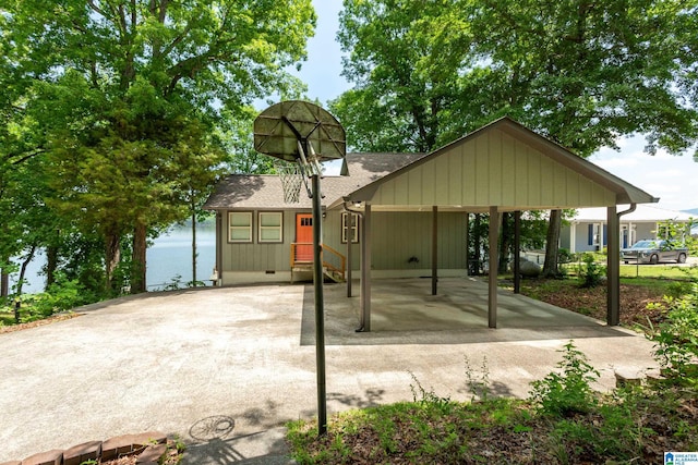 3516 Griffitt Bend Rd, Talladega, AL 35160 - view of front facade featuring roof with shingles and a carport
