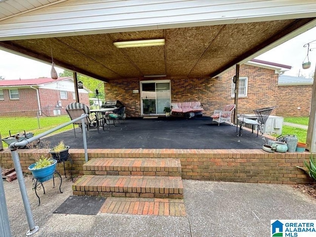view of patio with fence