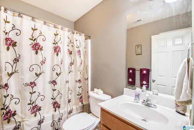 full bath featuring vanity, shower / tub combo, toilet, and visible vents