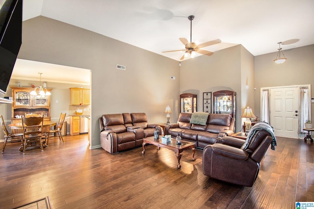 living room with high vaulted ceiling, visible vents, ceiling fan with notable chandelier, and dark wood-type flooring