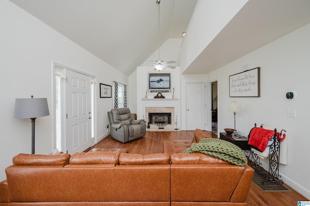 20443 Hepzibah Church Rd, Mccalla, AL 35111 - living room featuring a ceiling fan, a high end fireplace, vaulted ceiling, wood finished floors, and baseboards