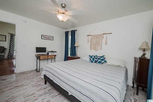 20443 Hepzibah Church Rd, Mccalla, AL 35111 - bedroom with baseboards, ceiling fan, and wood finished floors