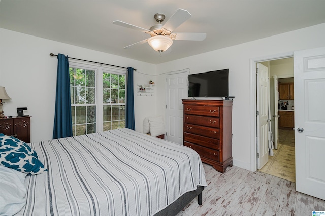 20443 Hepzibah Church Rd, Mccalla, AL 35111 - bedroom featuring ceiling fan and light wood-type flooring