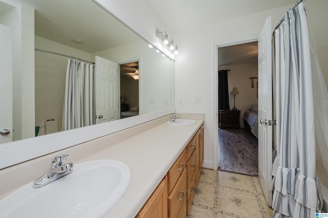 20443 Hepzibah Church Rd, Mccalla, AL 35111 - full bathroom with tile patterned flooring, a sink, connected bathroom, and double vanity