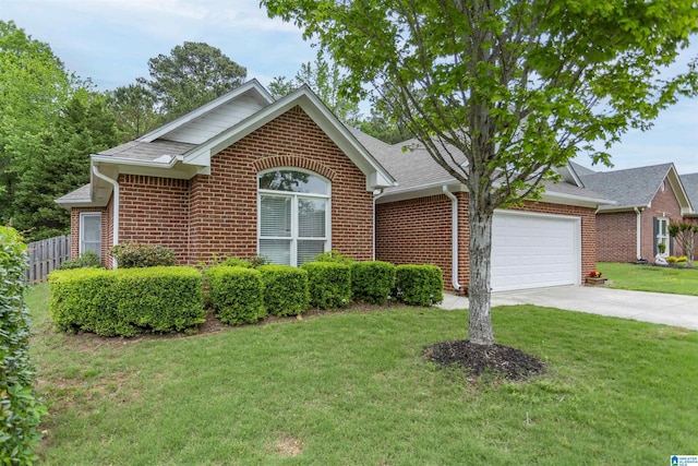ranch-style home featuring brick siding, fence, a front lawn, concrete driveway, and an attached garage