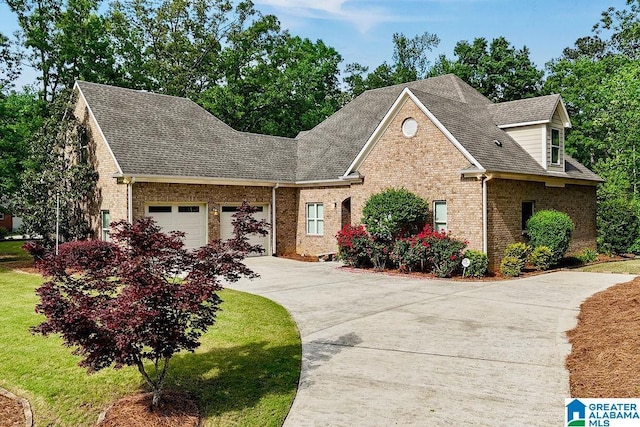 view of front of house featuring concrete driveway, brick siding, an attached garage, and roof with shingles