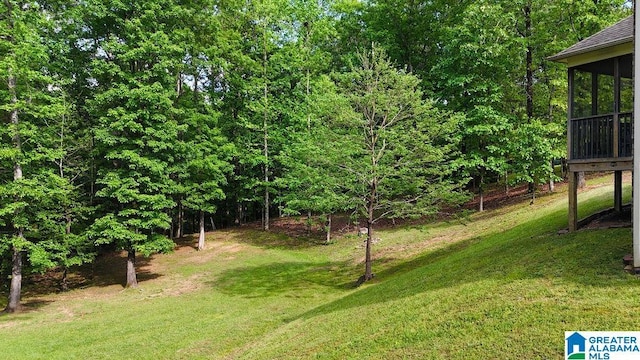 view of yard with a sunroom