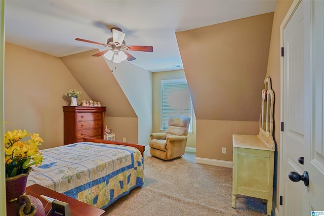 bedroom with carpet floors, visible vents, baseboards, a ceiling fan, and vaulted ceiling