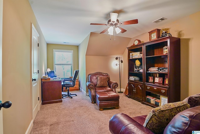 office area with carpet flooring, ceiling fan, visible vents, and baseboards