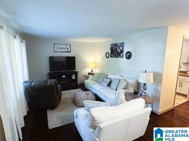 living area with wood finished floors