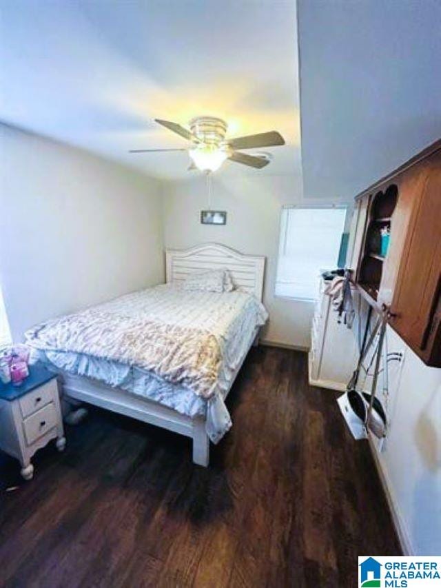 bedroom featuring ceiling fan and wood finished floors