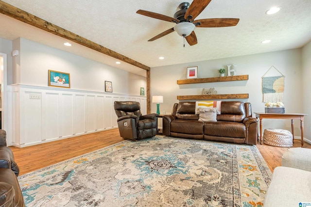 living room featuring recessed lighting, wood finished floors, and ceiling fan