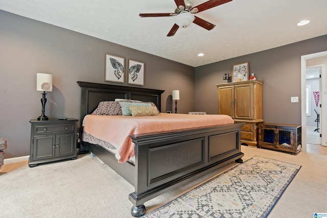 bedroom with recessed lighting, baseboards, a ceiling fan, and light carpet