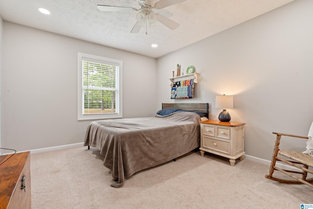 bedroom with recessed lighting, ceiling fan, light carpet, and baseboards