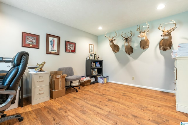 home office with baseboards, recessed lighting, and wood finished floors