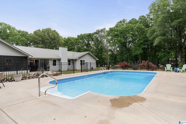 view of pool with fence, a patio area, and a fenced in pool