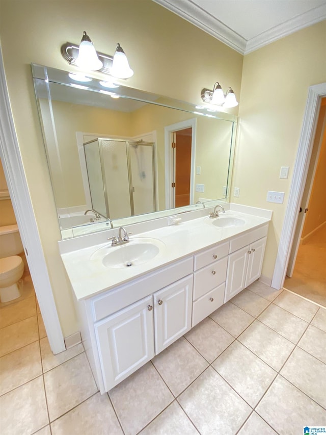 bathroom with tile patterned flooring, a sink, and a shower stall