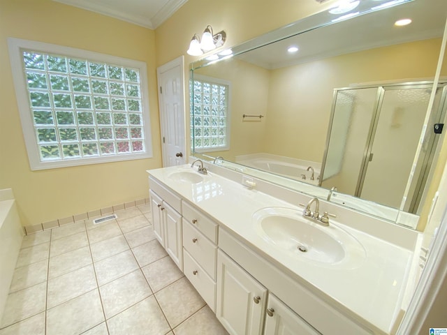 bathroom featuring ornamental molding, a bath, a sink, and a shower stall