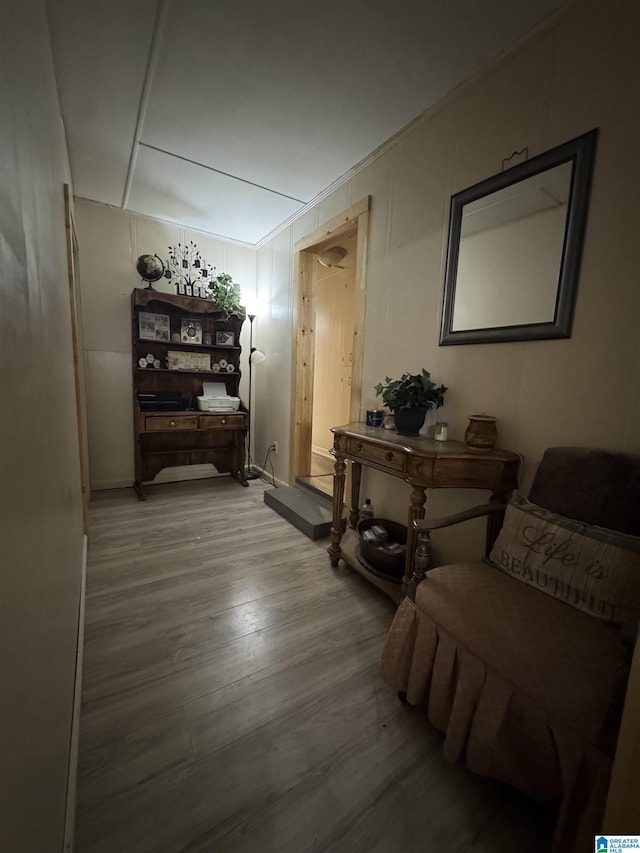 corridor featuring wood finished floors