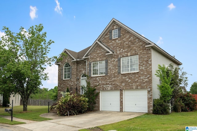 300 Stonecreek Cir, Helena, AL 35080 - view of front facade with a front yard, brick siding, concrete driveway, an attached garage, and fence