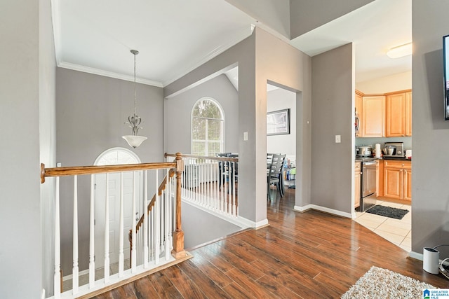 300 Stonecreek Cir, Helena, AL 35080 - hall featuring baseboards, wood finished floors, an upstairs landing, and ornamental molding