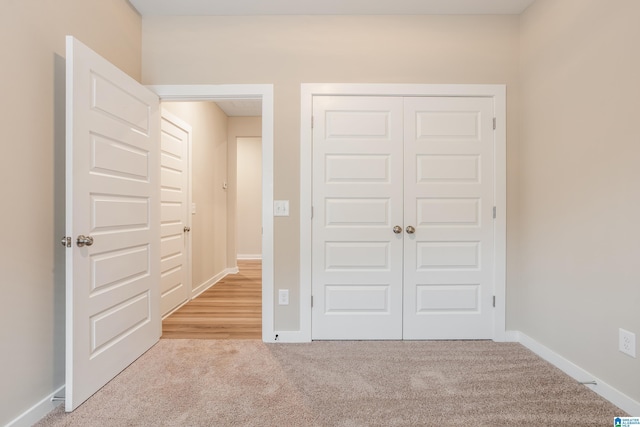 3757 Seaside Sparrow Cir, Bessemer, AL 35022 - unfurnished bedroom featuring baseboards, carpet floors, and a closet