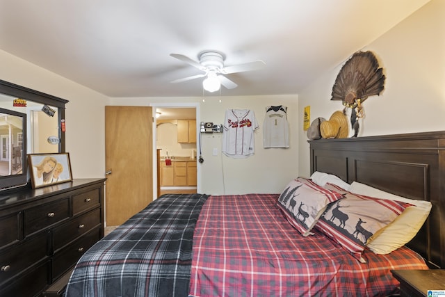 bedroom featuring ensuite bathroom and a ceiling fan