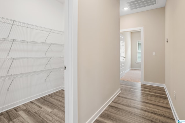 3769 Seaside Sparrow Cir, Bessemer, AL 35022 - hallway featuring recessed lighting, visible vents, wood finished floors, and baseboards